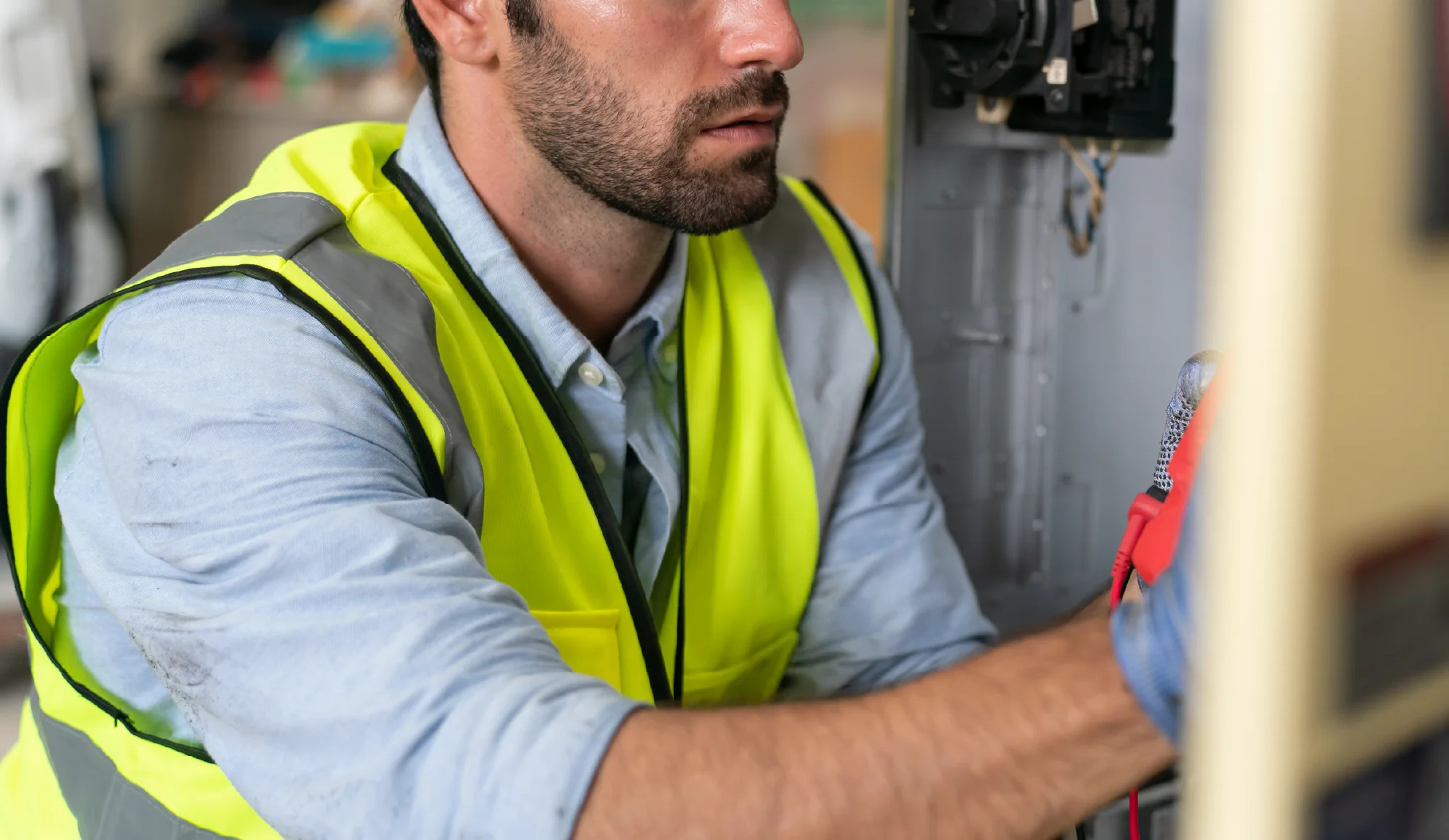 A picture of an electrician working